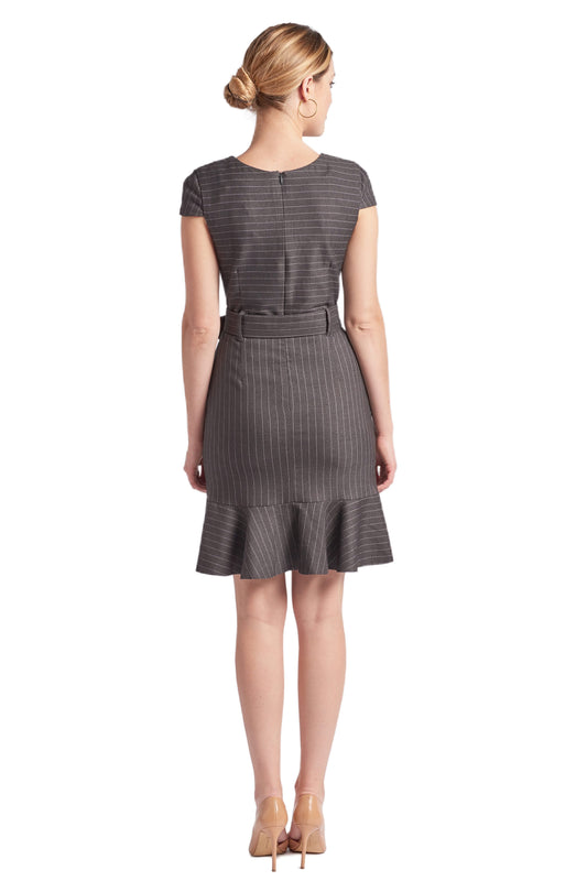 Back view of a charcoal pinstripe dress with cap sleeves, a self-belt, and a ruffle hem.