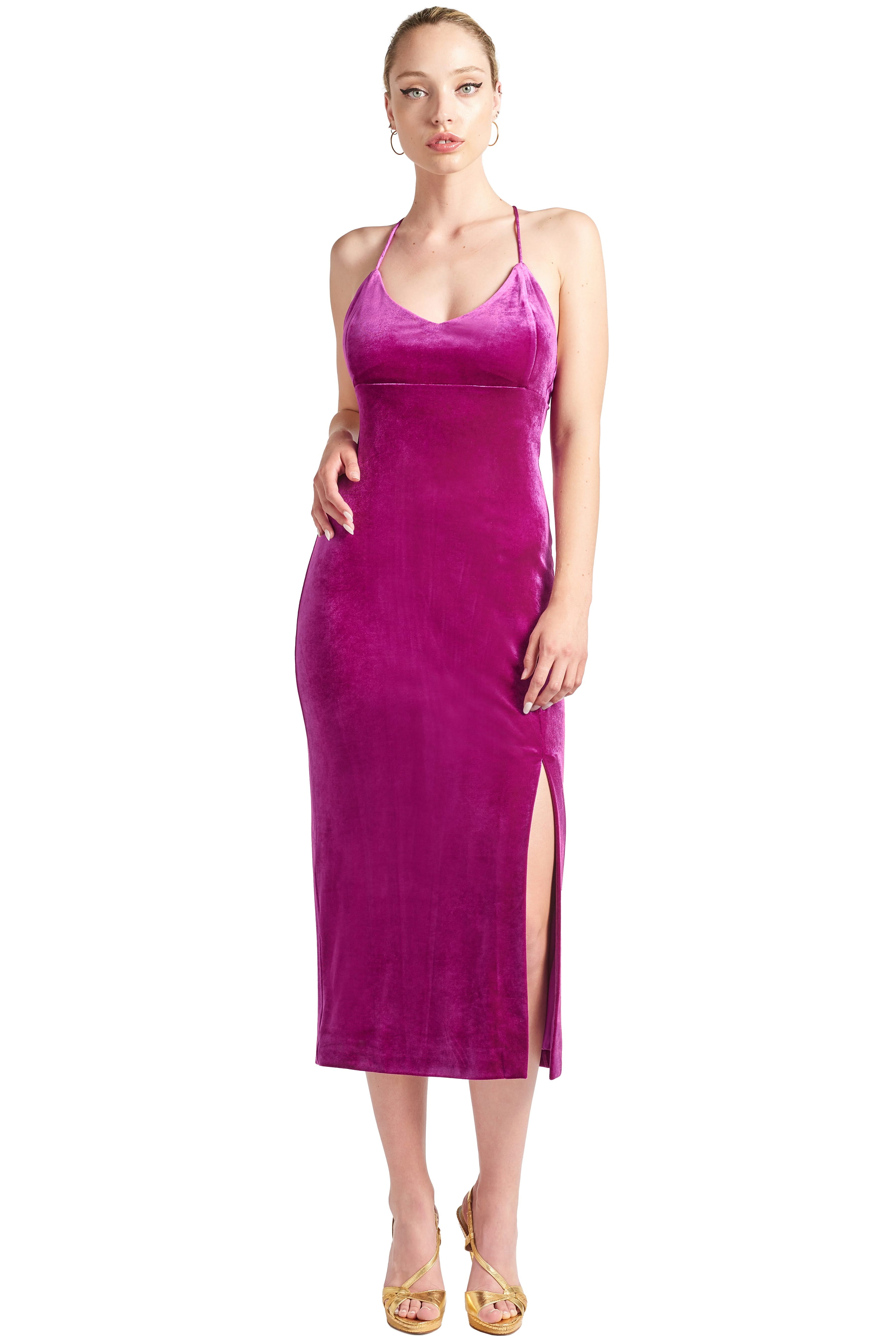Magenta velvet midi dress with a scoop neck, spaghetti straps and thigh slit.