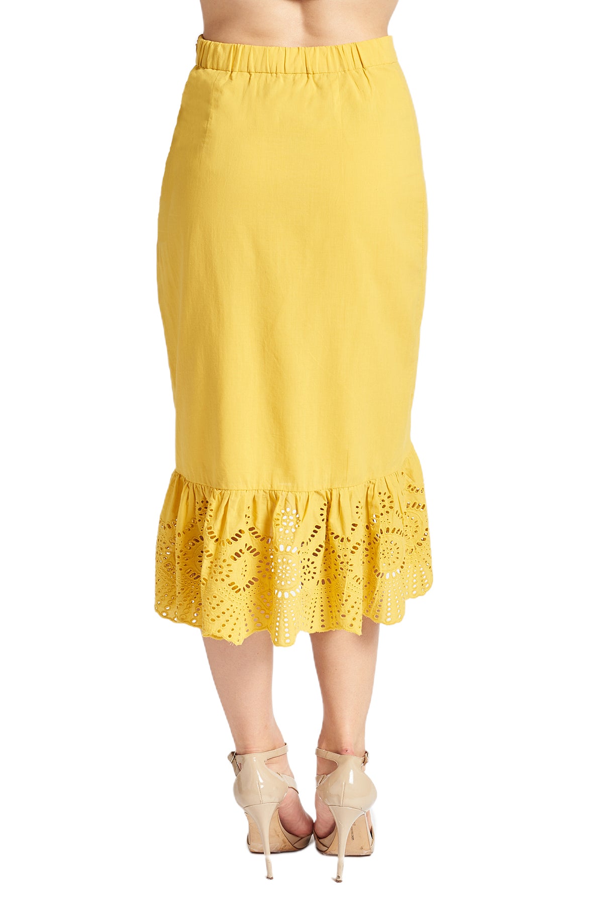 Back view of model wearing yellow cotton eyelet ruffle hem skirt.