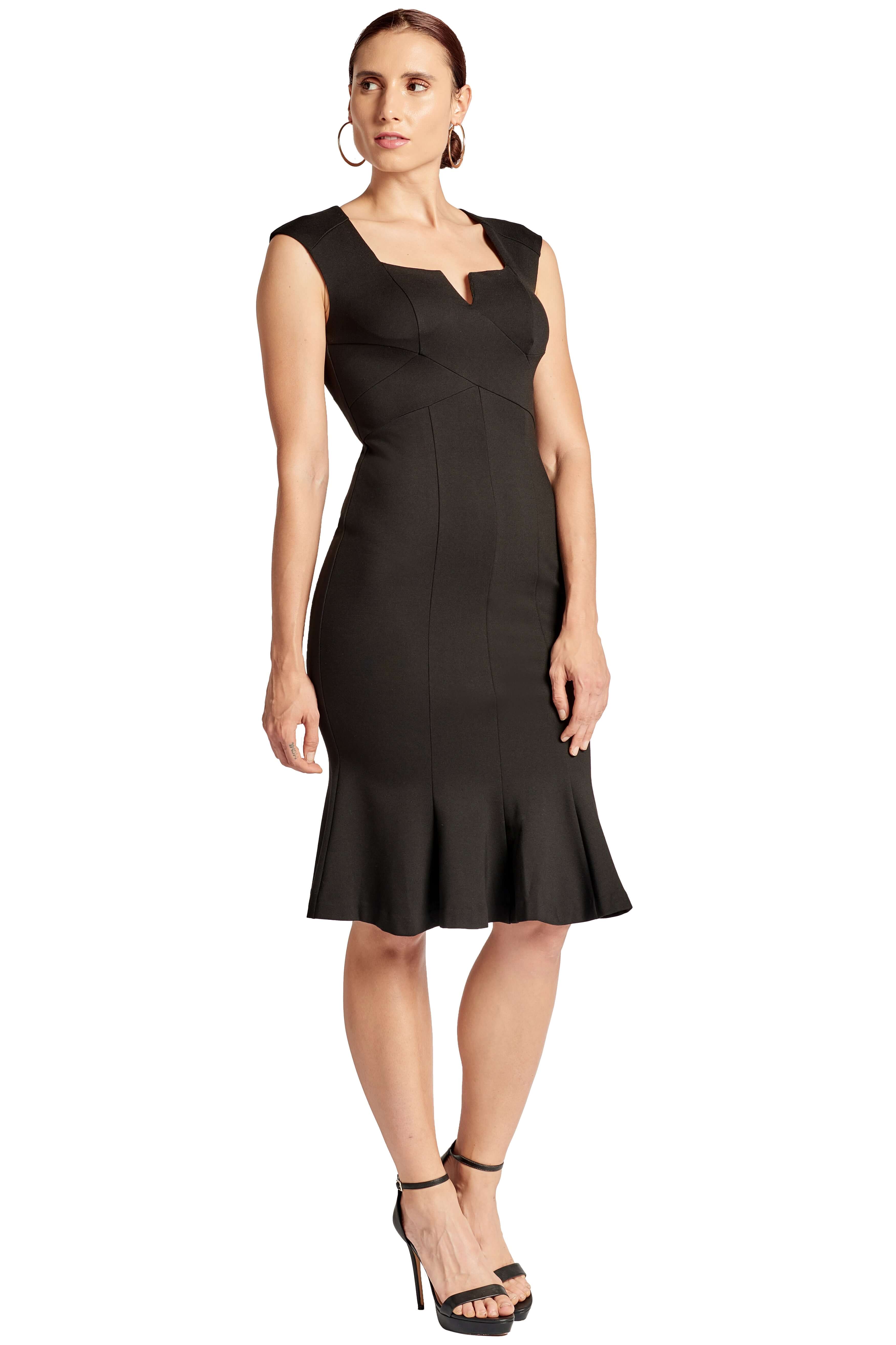 3/4 front view of model wearing the Simona Maghen Ivy Dress, black form-fitting seamed sleeveless square notch neck midi dress with mermaid hem.