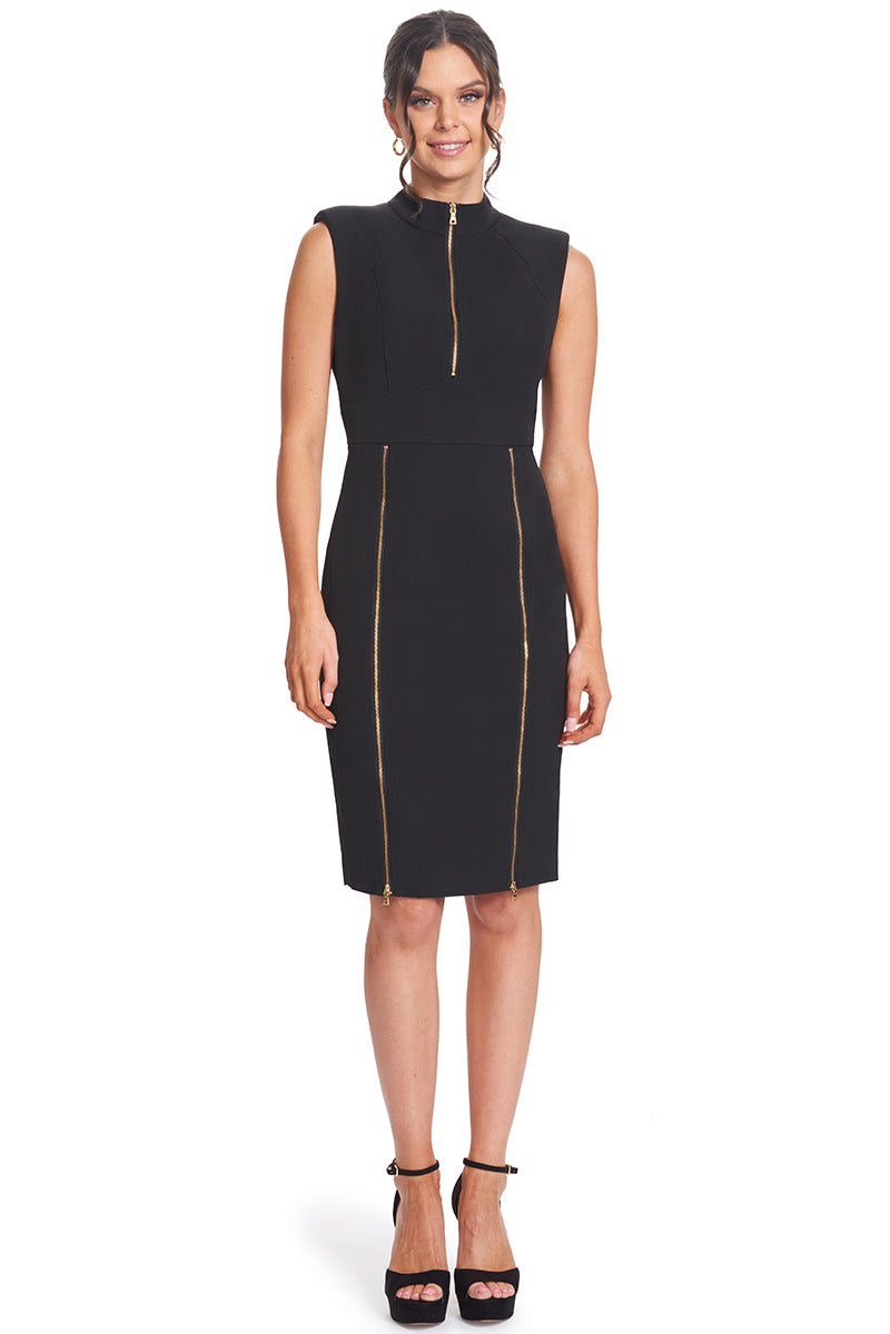 Front view, with all zippers zipped up, of model wearing the Simona Maghen Just Zip It Dress, little black sleeveless midi dress with exposed functional gold zippers down the center back for entry, center front bodice and along the skirt front princess seams.