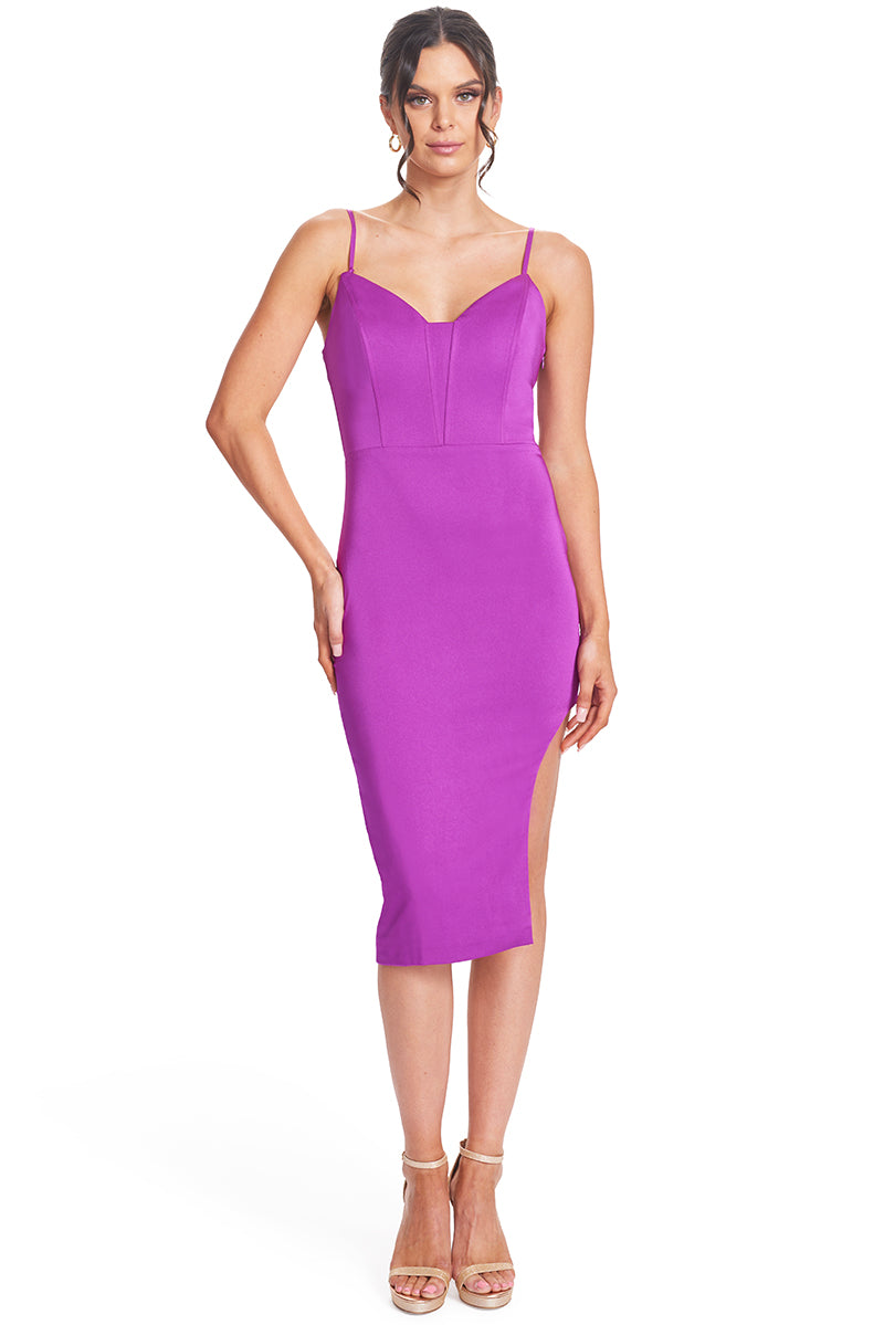 Front view of model wearing the Simona Maghen Va Va Voom Dress, magenta satin midi doby-con dress with pointed bodice, removable straps and left side skirt cut-out.