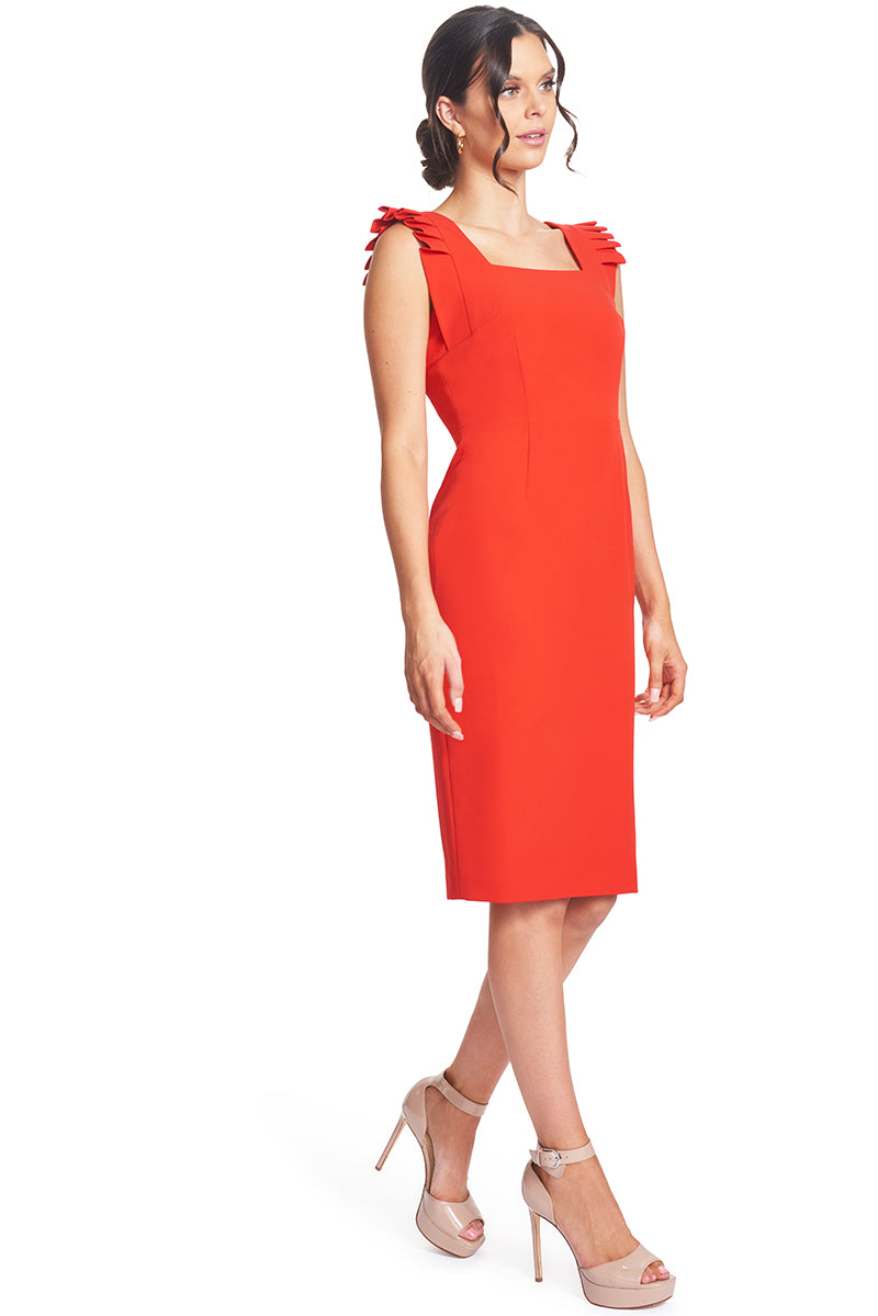 3/4 front view of model wearing the Simona Maghen Monarch Dress, red double square neck midi sheath dress with alluring pleat detail along the top edge of the arm opening.