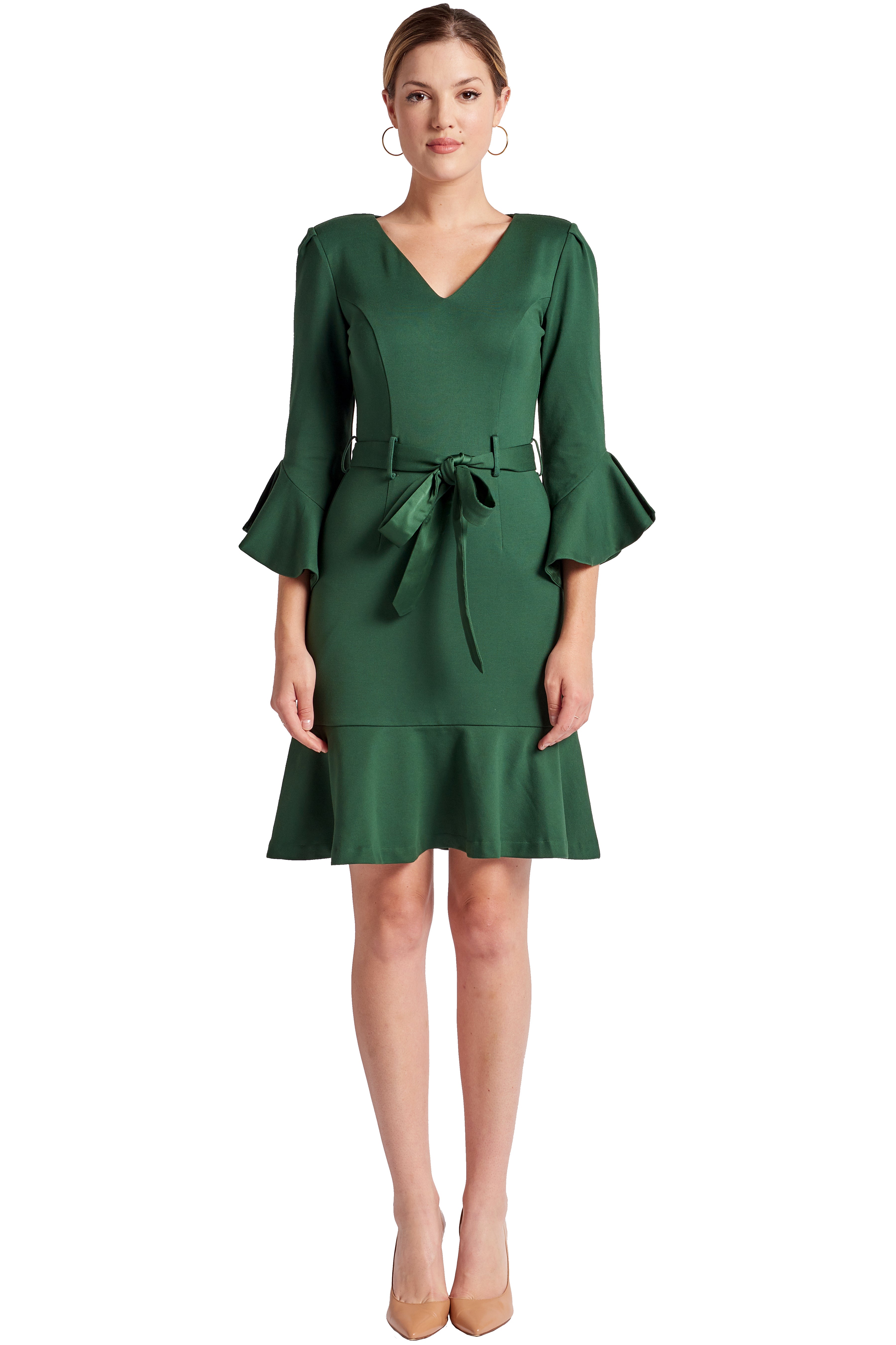 Front view of model wearing the Simona Maghen Tayte Dress in forest green, knee length, v-neck knit Ponte dress with 3/4 bell sleeves, ruffle hem and self belt.