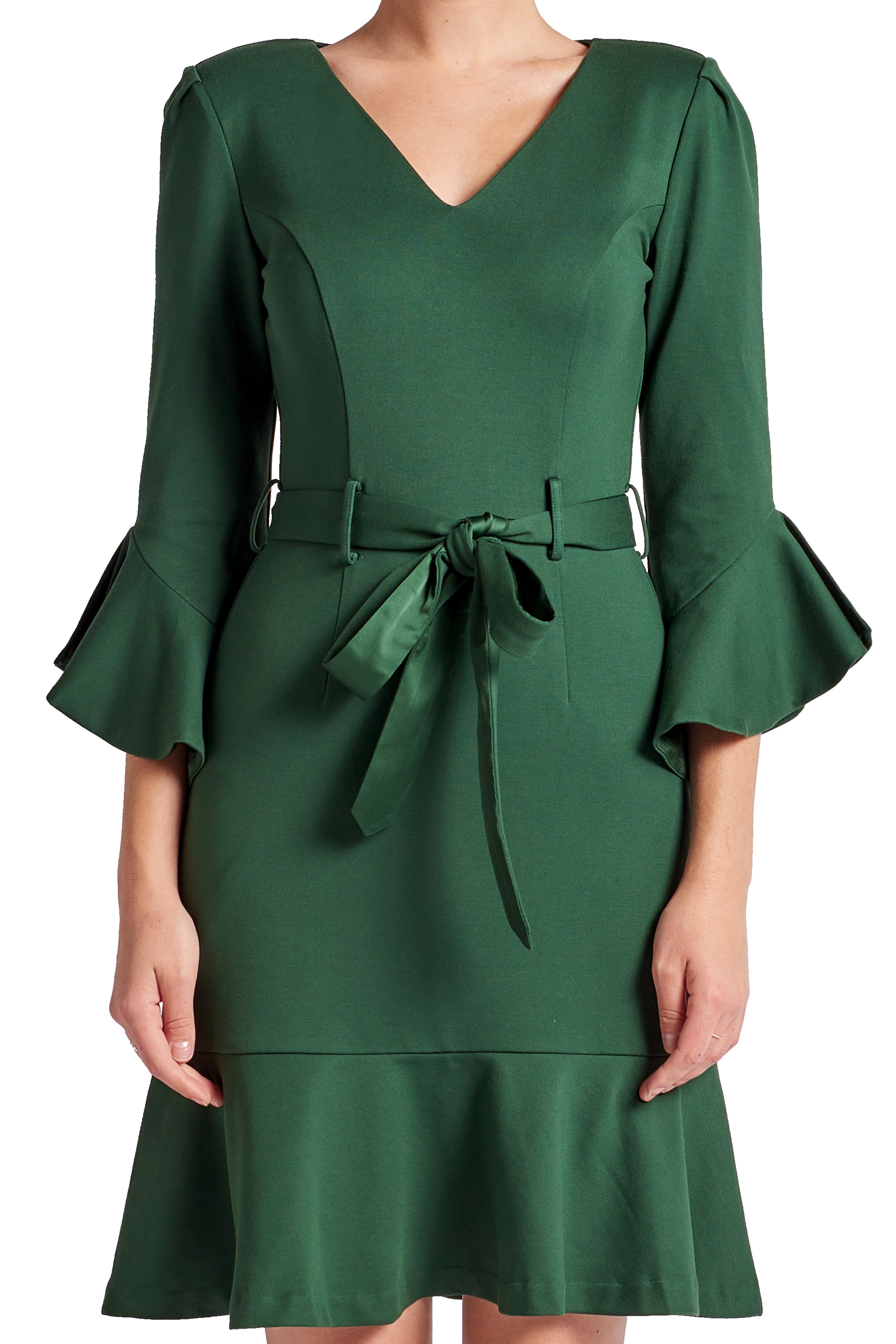 Close-up front view of model wearing the Simona Maghen Tayte Dress in forest green, knee length, v-neck knit Ponte dress with 3/4 bell sleeves, ruffle hem and self belt.