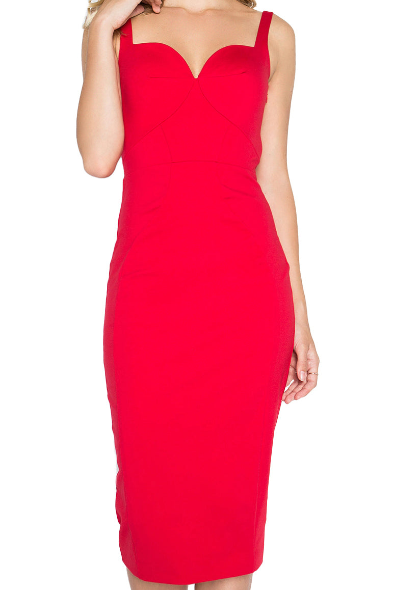 Close-up front view of model wearing the Simona Maghen Homa Dress, red midi knit Ponte sleeveless dress with adjustable straps, sweetheart neckline, low back, and large bow at back waist.